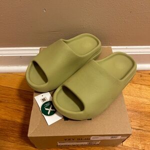 Authentic Adidas Yeezy slide, color Resin , size 5 youth/ unisex